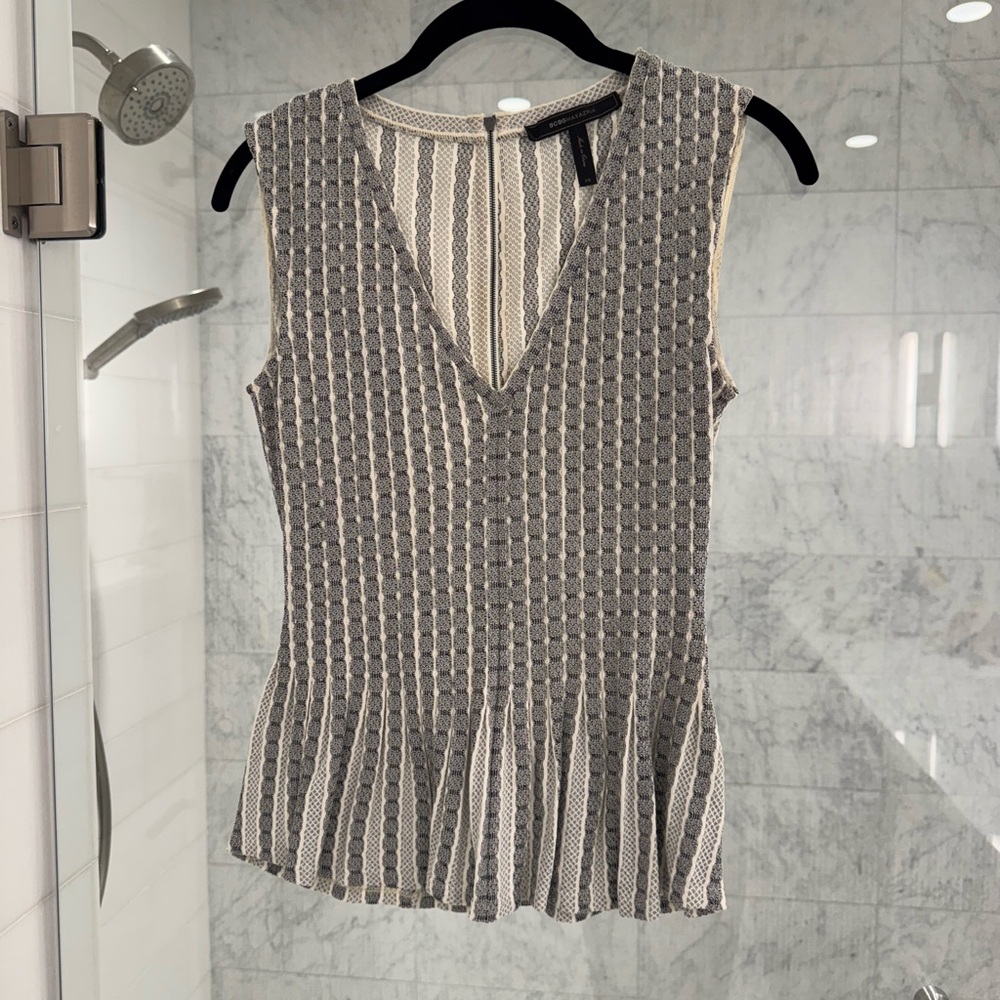 BCBG Peplum vneck sleeveless top